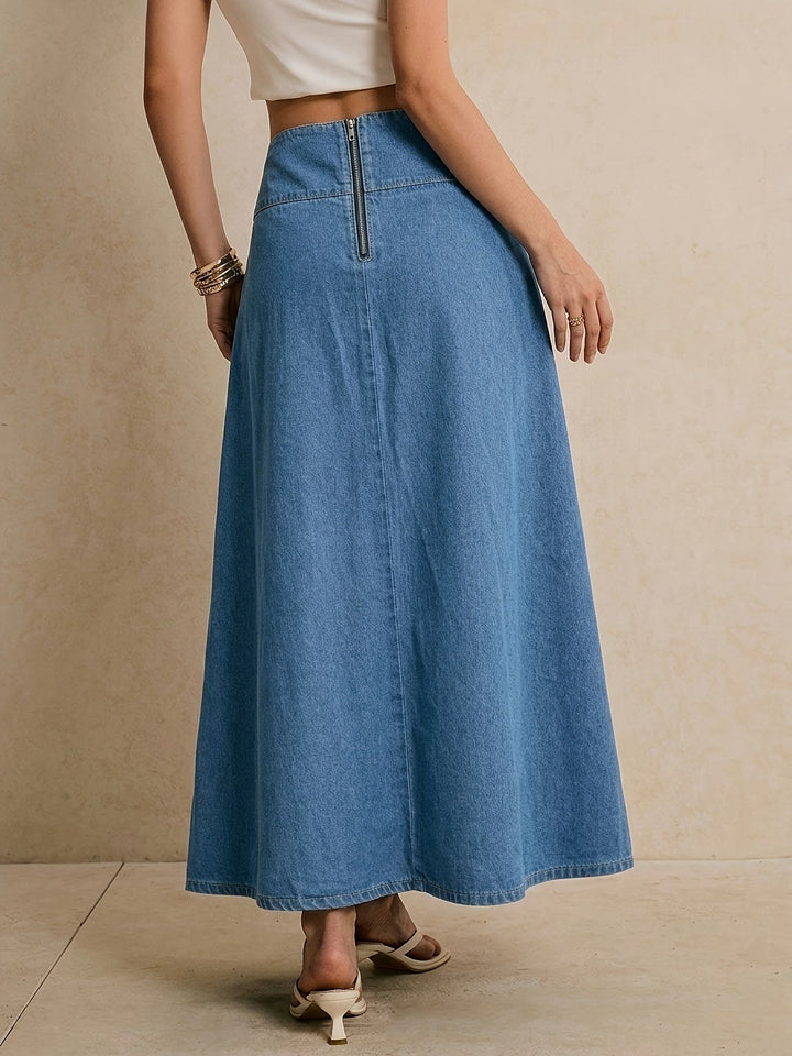 Flowing A-line women's blue denim maxi skirt with a comfortable tie waist, ideal for summer outfits.