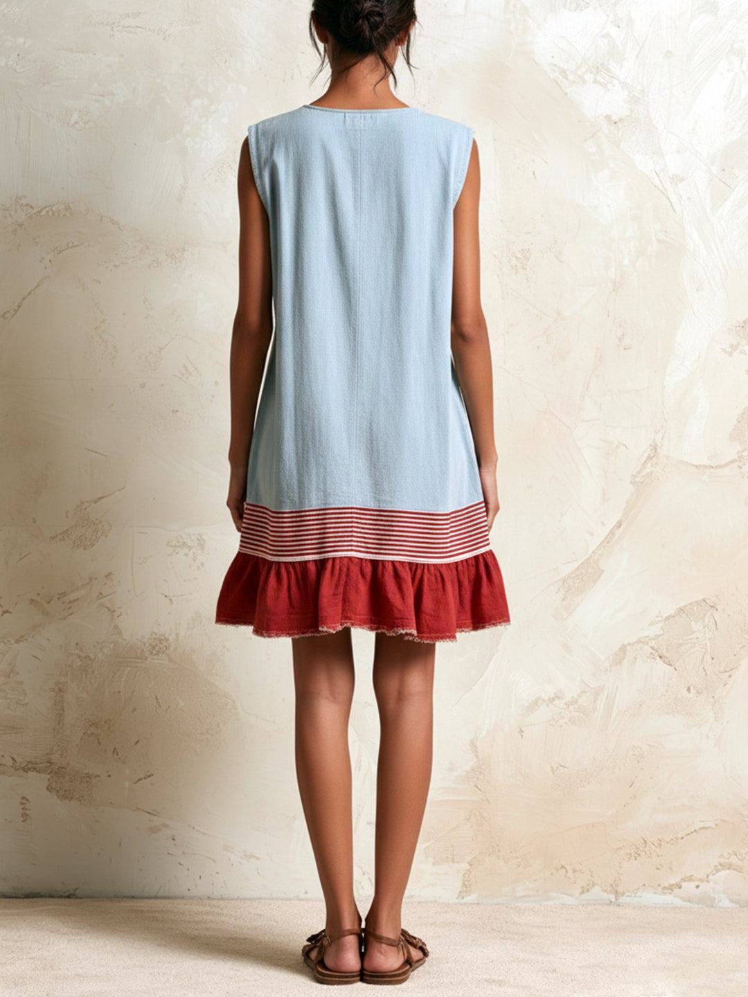 Vibrant blue mini dress for women. Features a stylish ruffle tiered hem, great for sunny casual days.