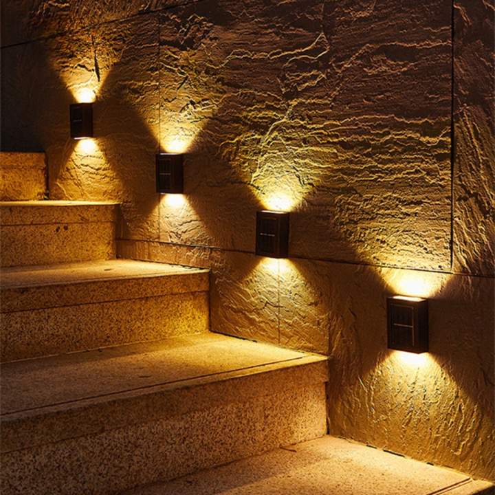 Effortless solar LED wall lights for outdoor garden illumination, providing wireless, eco-friendly exterior lighting.