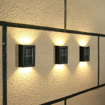 Modern solar LED wall lights for garden ambiance. Wireless, energy-saving exterior illumination for any home.