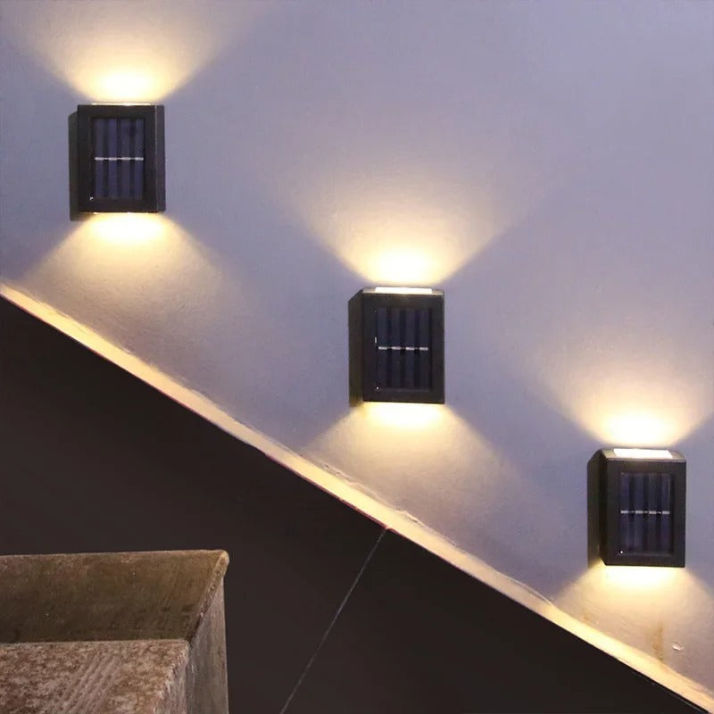 Wireless solar LED wall mounted lights providing bright, eco-friendly outdoor illumination for gardens & patios.