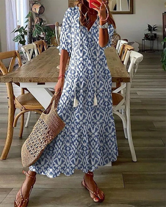 Effortless women's bohemian maxi dress. Flowing fabric, perfect for comfortable summer days & elegant boho chic style.