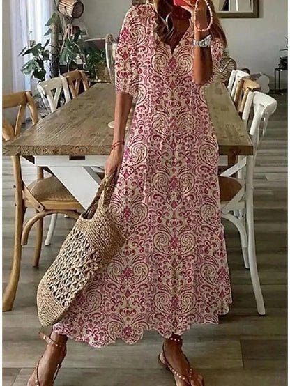 Elegant women's bohemian maxi dress. Flowing and effortless design, perfect for a chic summer or casual look.