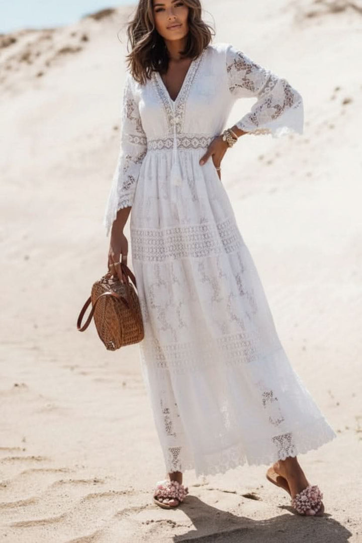 Women's casual V-neck maxi dress with boho style, ideal for vacation or a chic summer day to night look.