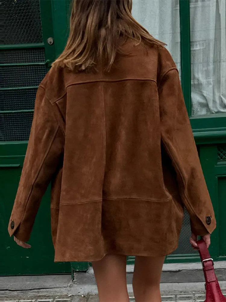 Brown loose jacket for women, offering an effortless and casual chic look for transitional seasons.