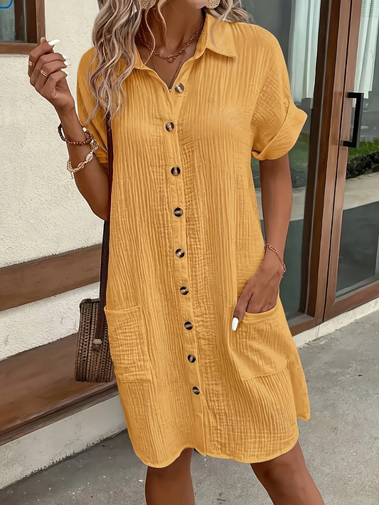 Effortless women's button-front shirt dress for summer comfort. Casual, breezy day wear.