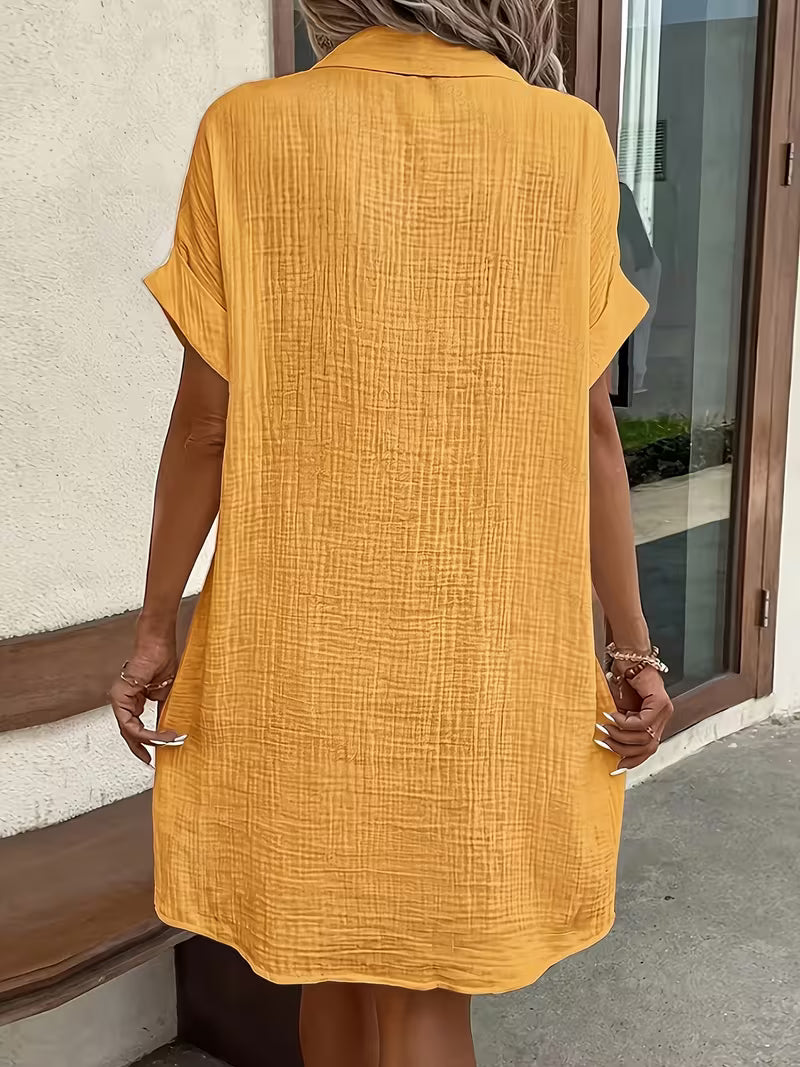 Versatile women's summer shirt dress. Button-front, breezy for casual wear, day outings, or vacation.