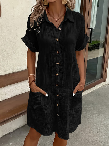 Chic women's button-front collared shirt dress. Ideal summer fashion with pockets for effortless style.