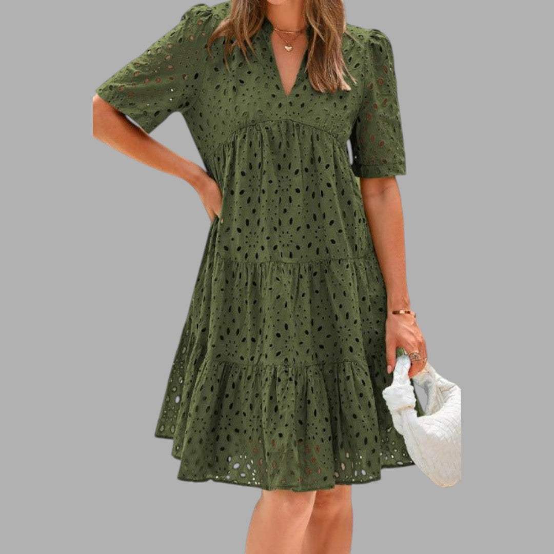 Model wears a chic women's casual mini dress, perfect for relaxed everyday outings. Comfortable & stylish.