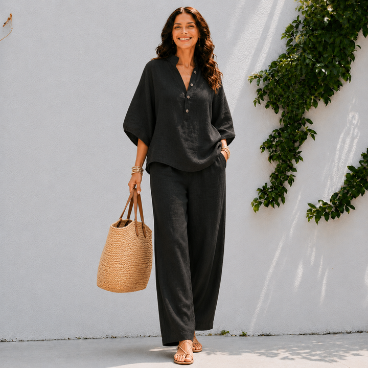 Stylish women's oversized blouse & wide leg pants matching set. Effortless two-piece for casual chic spring fashion.