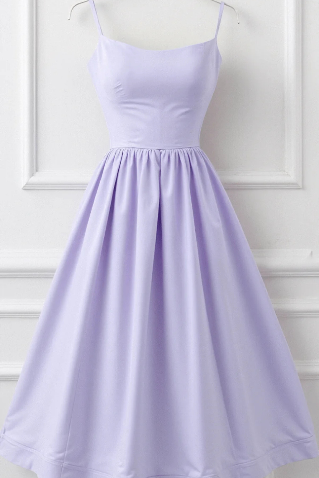 Elegant Women's Spaghetti Strap Midi Sundress. Feminine flowing midi dress, perfect for day or summer parties.