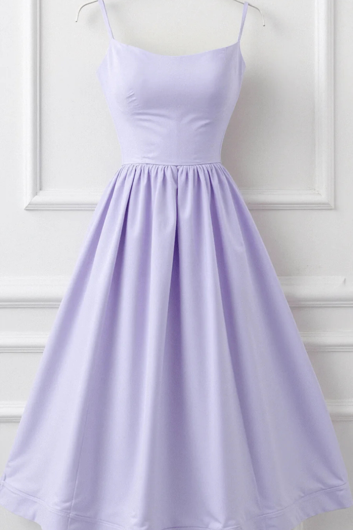 Elegant Women's Spaghetti Strap Midi Sundress. Feminine flowing midi dress, perfect for day or summer parties.