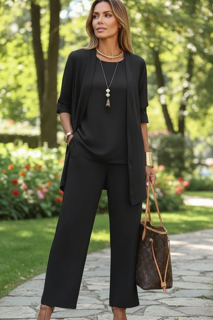 Chic women's resort wear 3-piece summer outfit, ideal for vacation, with comfortable flowy pants.