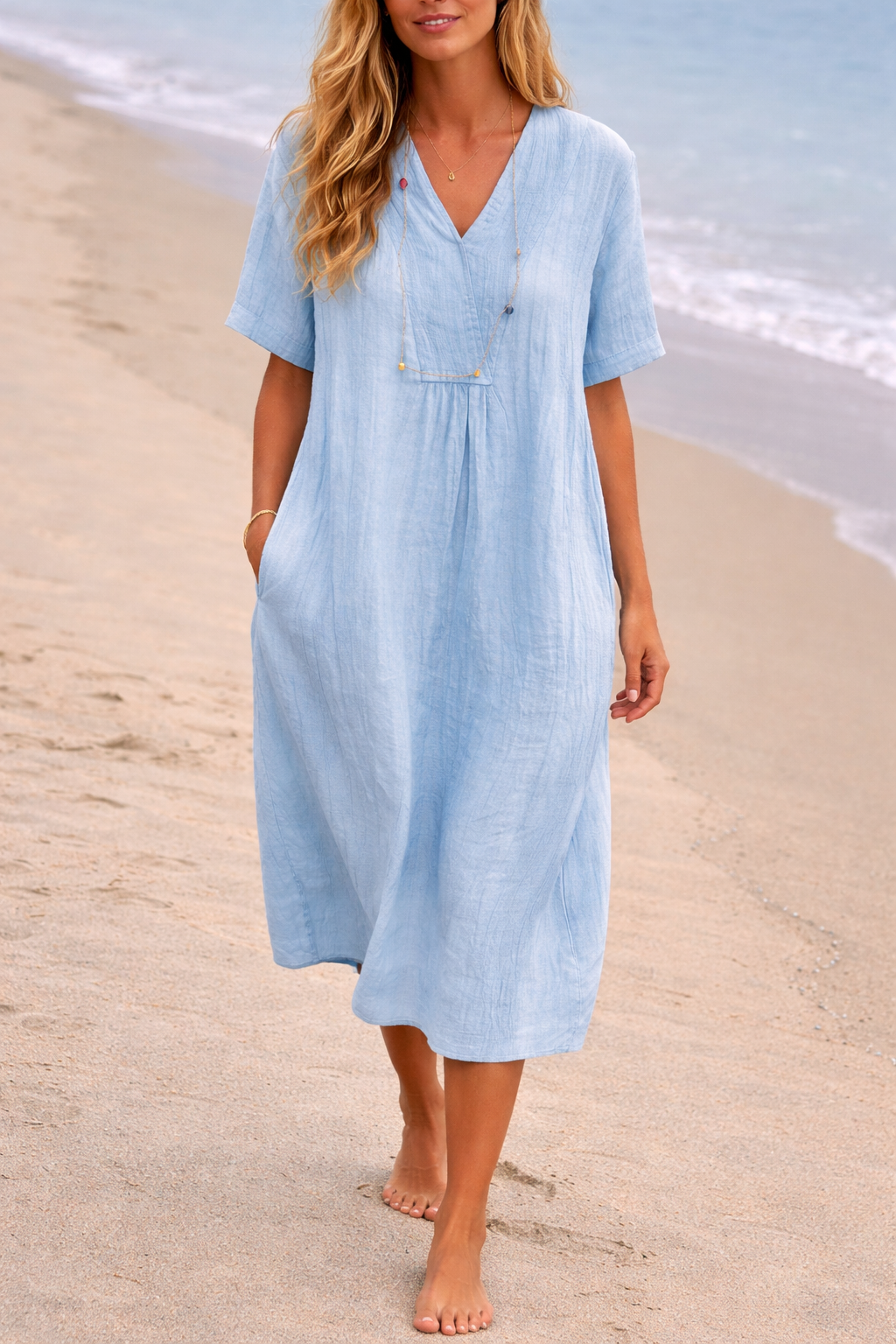 Comfortable black V-neck loose fit midi dress for women, ideal as a casual summer dress or elegant ensemble.