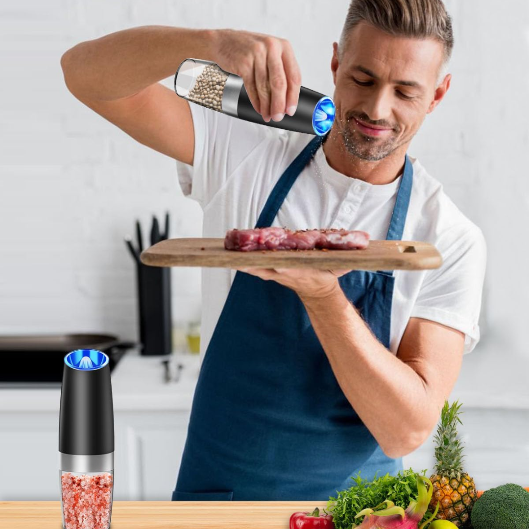 Electric pepper & salt mill set, rechargeable, sleek stainless steel design for modern kitchens.