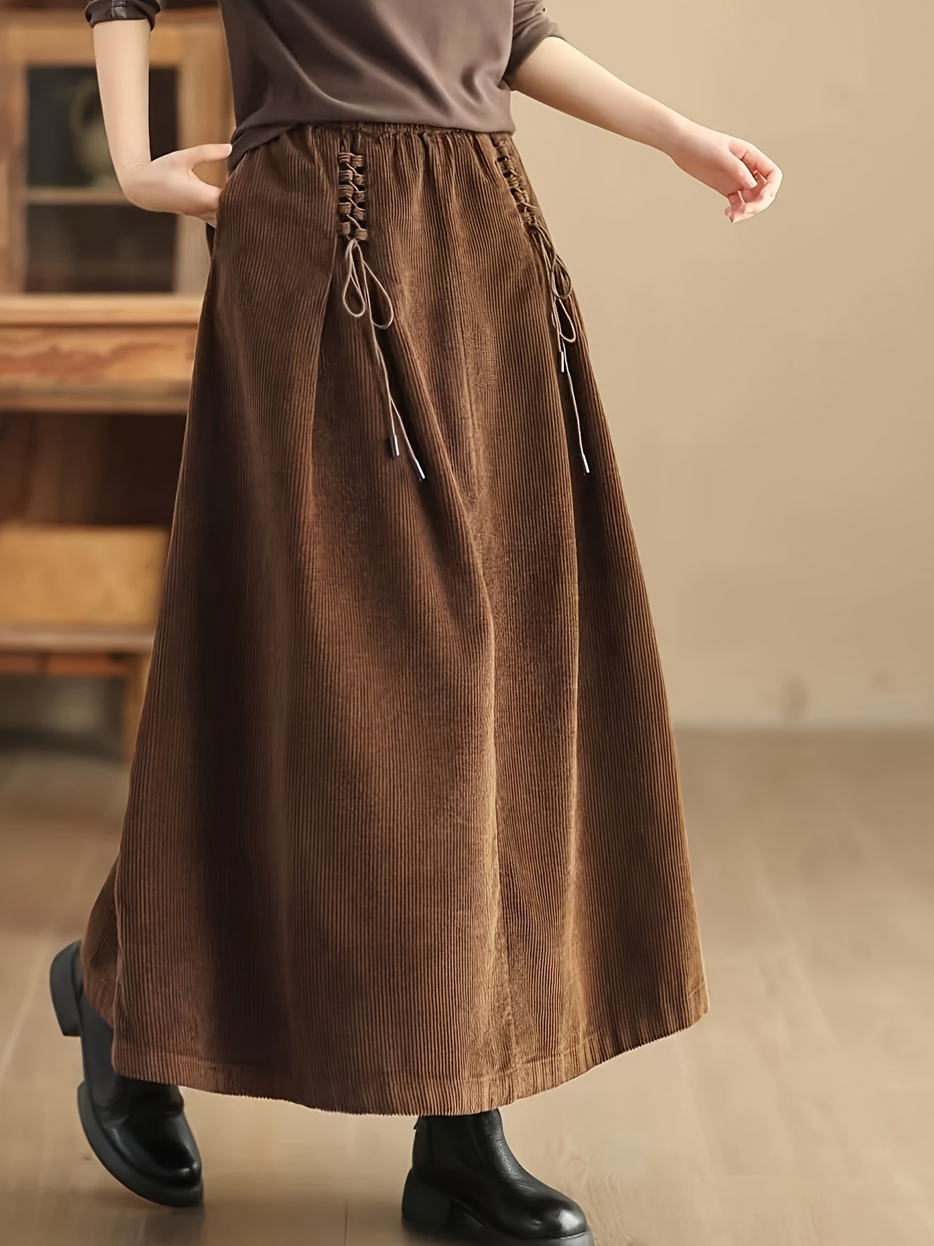 Versatile women's A-Line maxi skirt with elegant corset detail, suitable for casual & occasion wear.