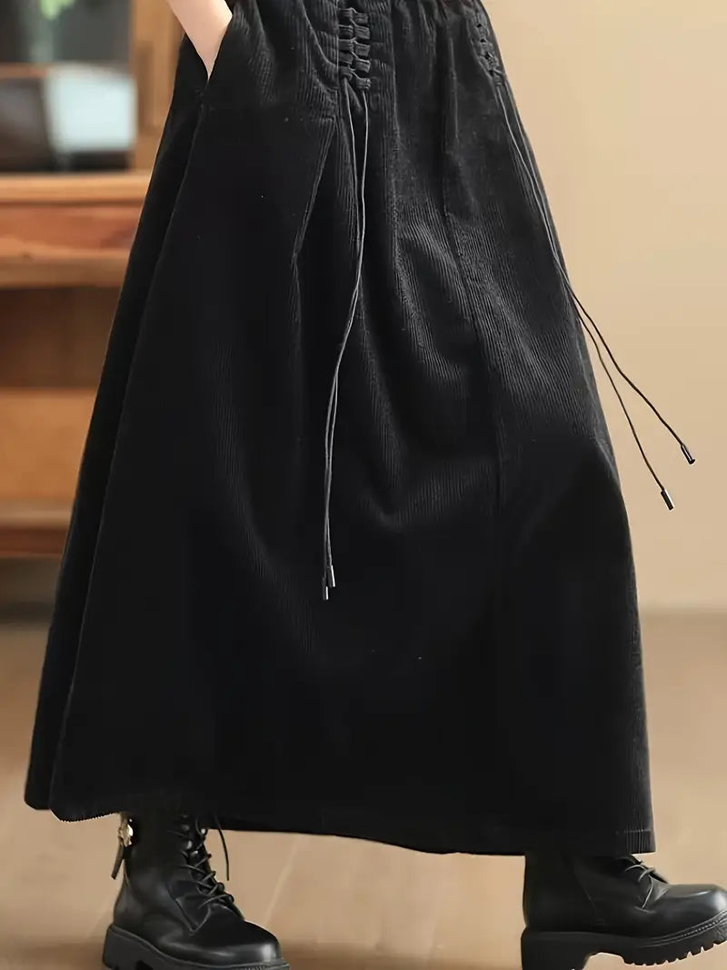 Graceful women's long A-Line skirt with delicate corset detailing, enhancing an elegant silhouette.