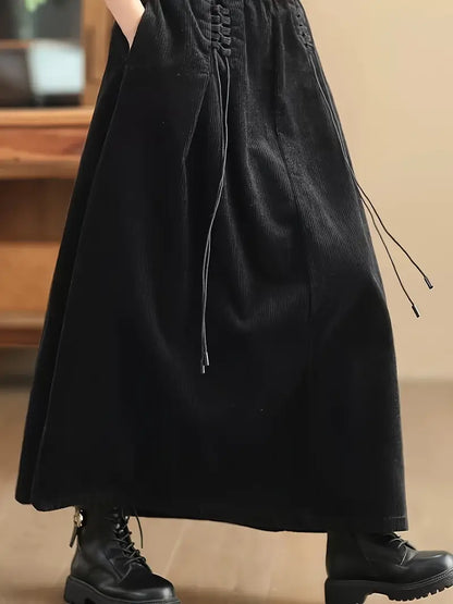 Graceful women's long A-Line skirt with delicate corset detailing, enhancing an elegant silhouette.