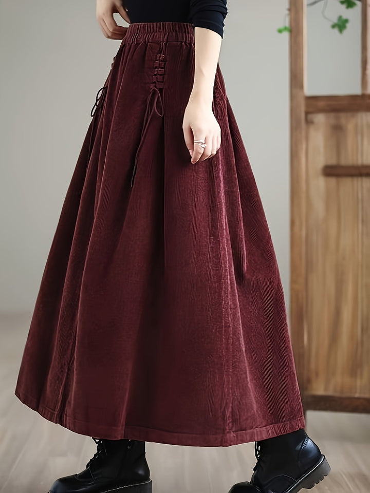 Comfortable women's A-Line maxi skirt with a stretch waist and elegant corset detail, ideal for everyday.