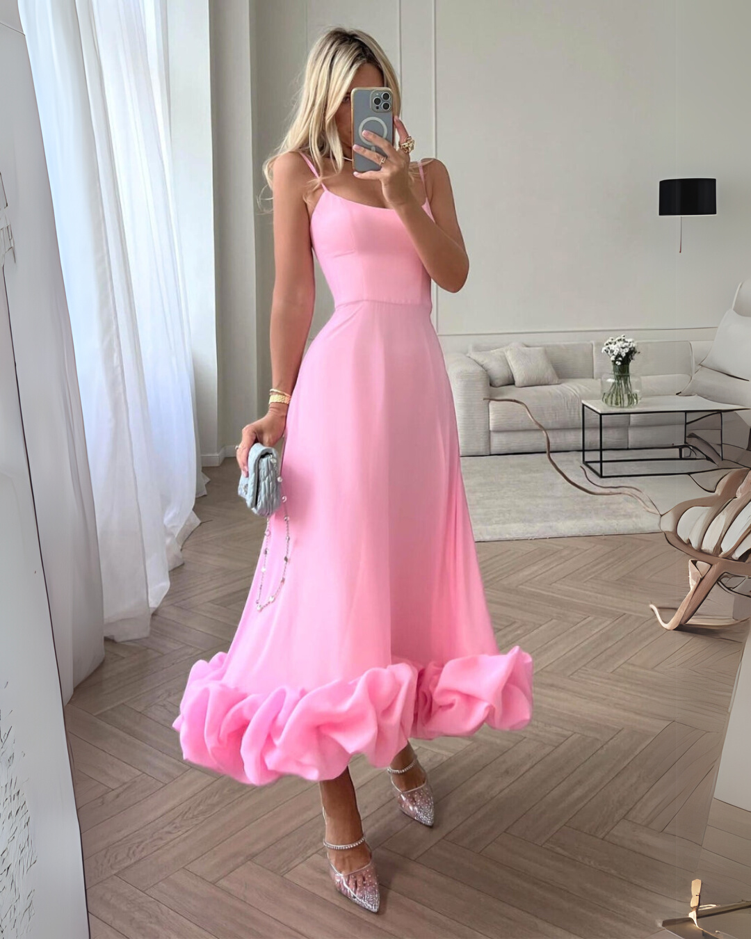 Elegant A-line women's twirl dress, perfect for wedding guests & parties. Effortless sleeveless chic style.