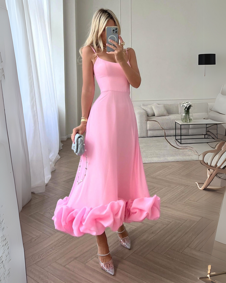 Elegant A-line women's twirl dress, perfect for wedding guests & parties. Effortless sleeveless chic style.