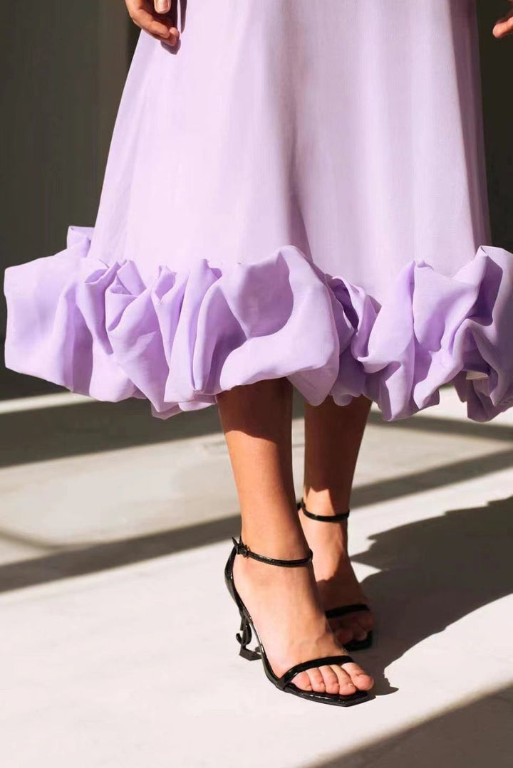 Effortless chic women's twirl dress, elegant A-line sleeveless. Ideal for wedding guests & summer parties.
