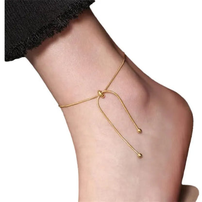 Sophisticated gold adjustable chain anklet, a delicate and elegant accessory for women's fashion.