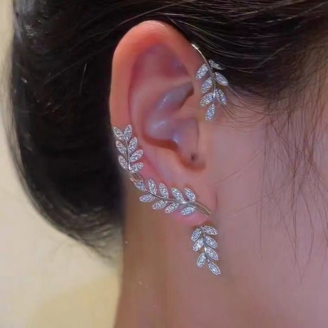 Modern elegant clip on earrings for non-pierced ears. Adjustable design, comfortable women's fashion jewelry.