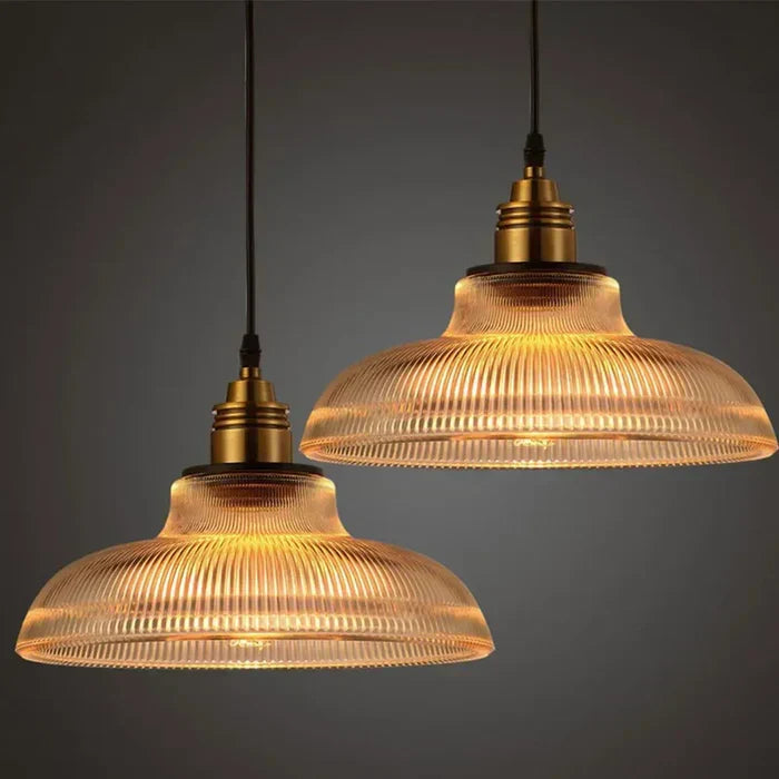 Elegant amber glass pendant lamp, a modern ceiling light fixture perfect for stylish home lighting.