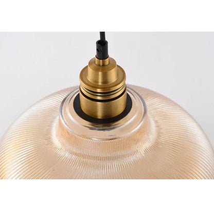 Stylish modern glass pendant lamp, an elegant ceiling light fixture for contemporary home interior design.