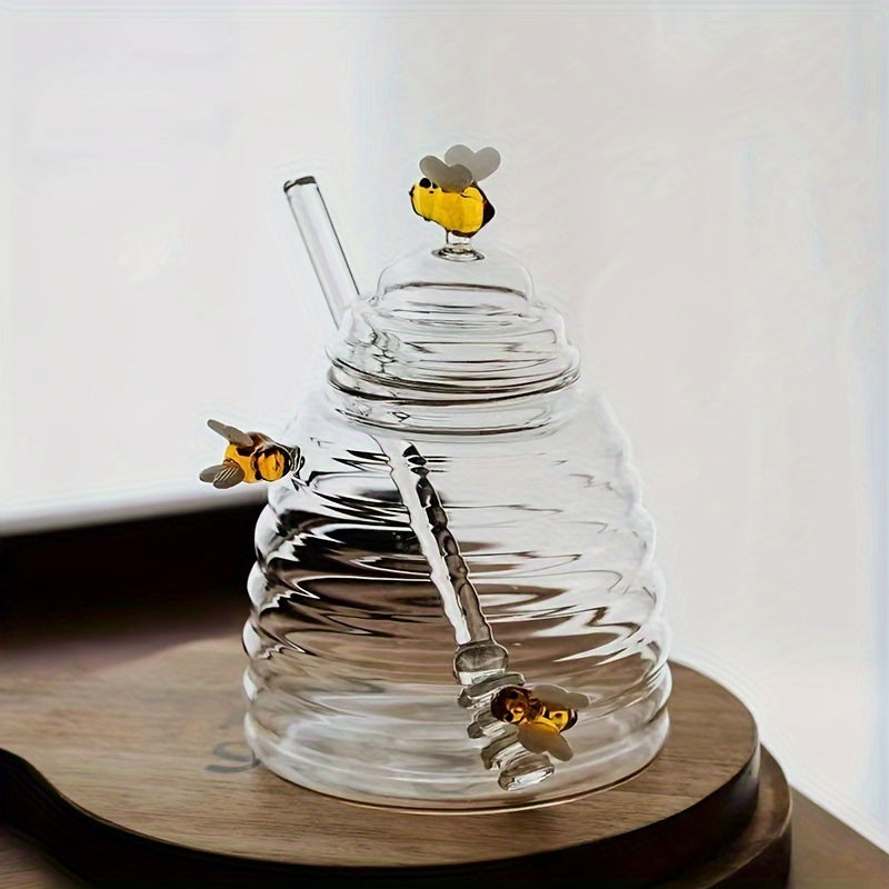 Clear borosilicate beehive glass honey jar, ideal for serving honey or syrup.