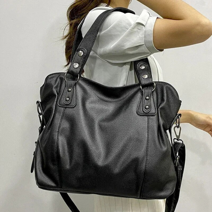 Elegant beige luxury leather shoulder bag for women, EliteCarry, featuring classic style for everyday use.