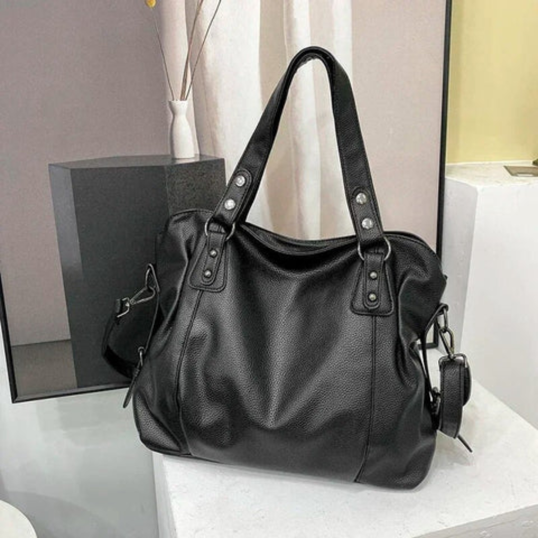 Chic beige women's leather shoulder bag, EliteCarry, a luxury everyday tote with a timeless elegant design.