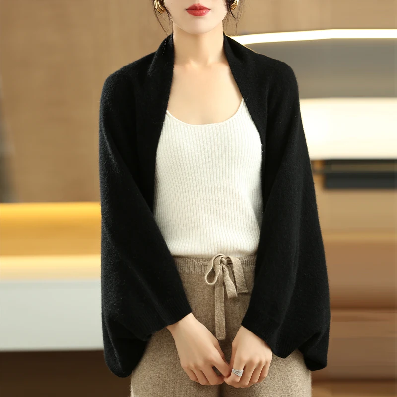 Versatile camel women's cascade shawl, ideal as an elegant scarf or cozy wrap.
