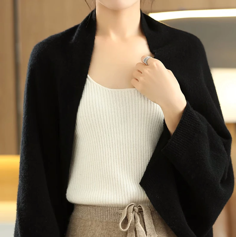 Comfortable & elegant women's cascade shawl wrap, a stylish multi-way accessory.