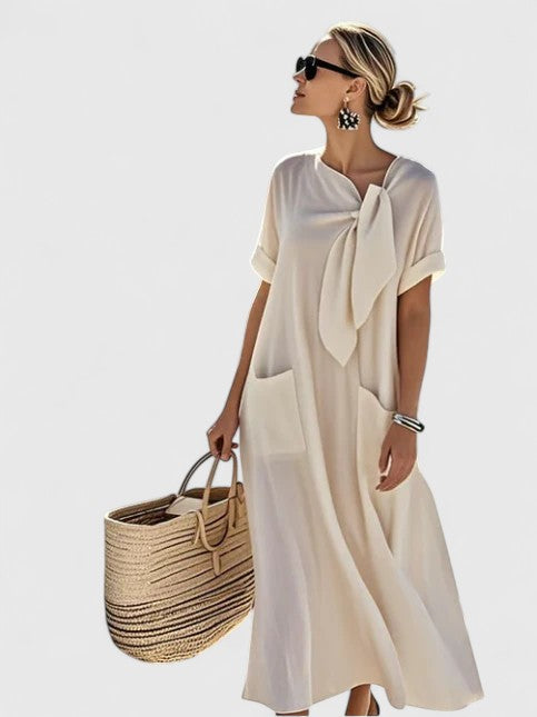 Blue women's elegant summer midi dress, effortless flowing style. Perfect for casual chic, vacation, or day to evening.