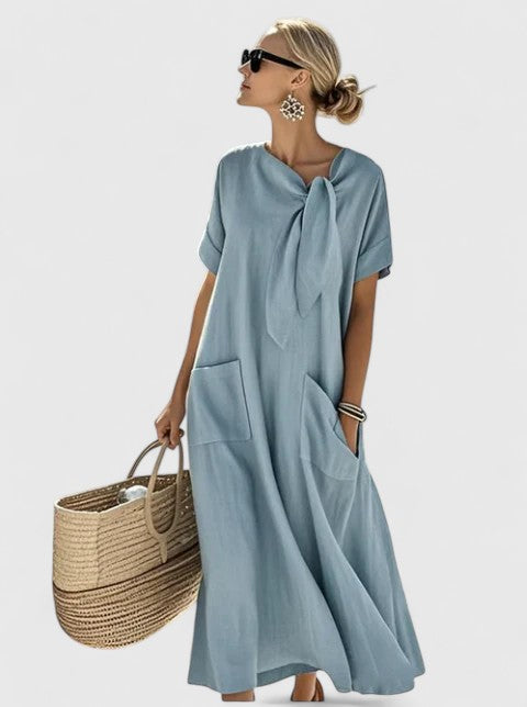 Khaki flowing midi dress for women, elegant summer style, comfortable and chic for day to evening wear.