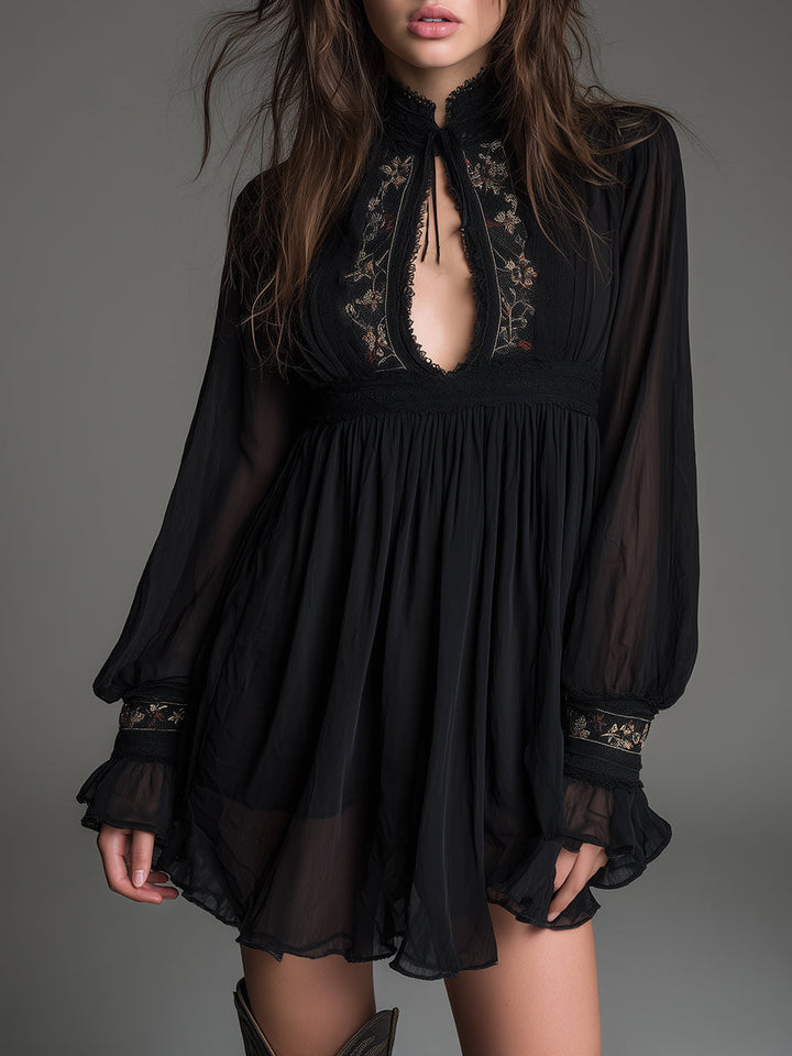 Elegant black babydoll mini dress for women, featuring a stylish keyhole neckline and flowy design.