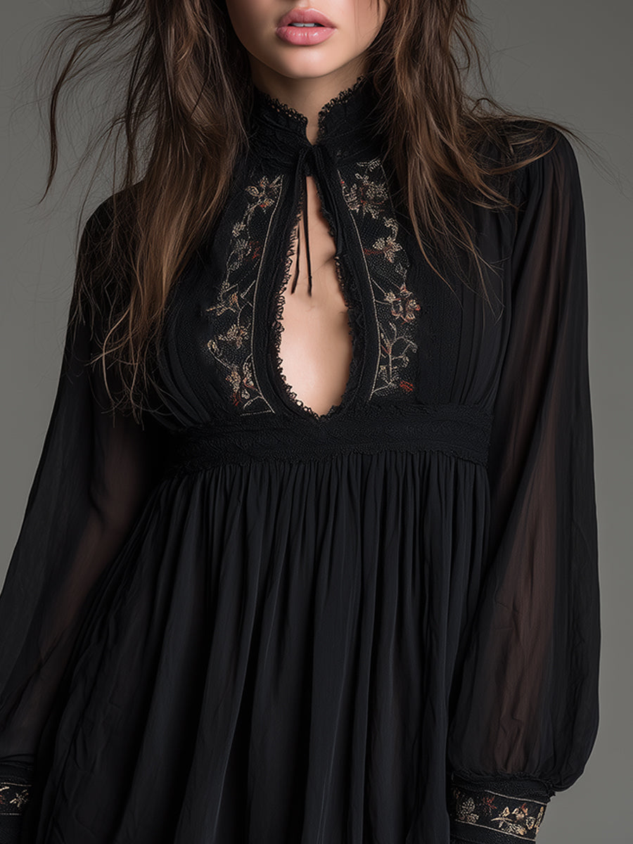 Women's black babydoll mini dress with keyhole neckline, perfect for elegant evening wear or a party.