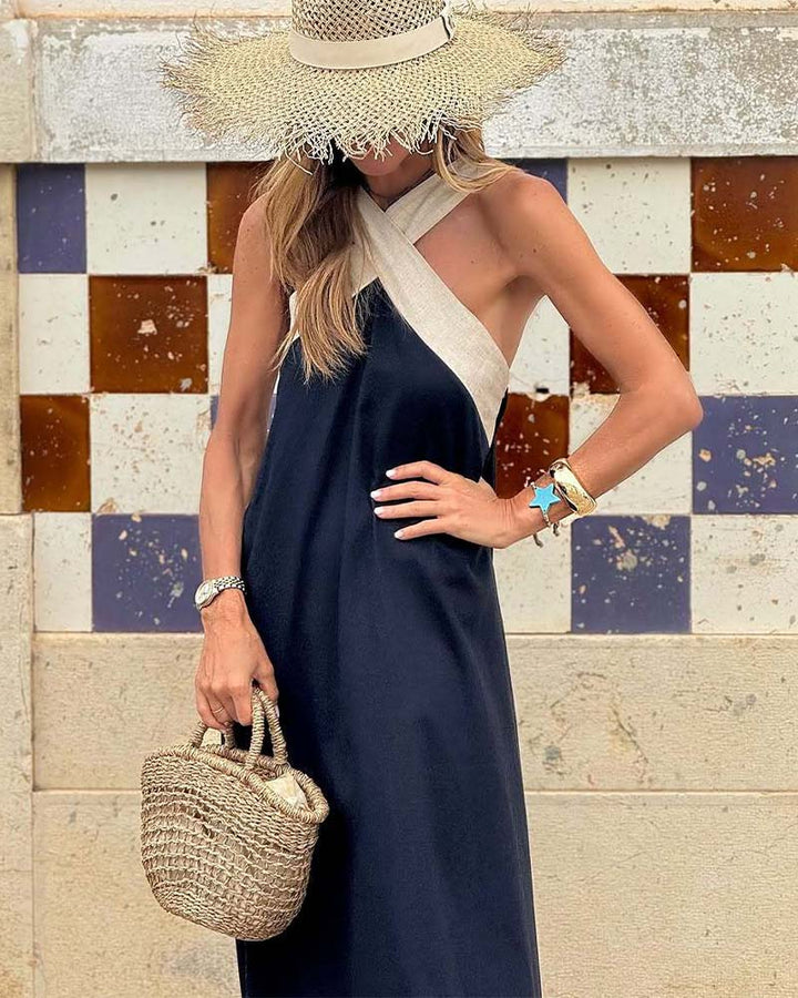 Elegant white cross-neck A-line summer dress for women, ideal as a comfy beach or vacation dress.