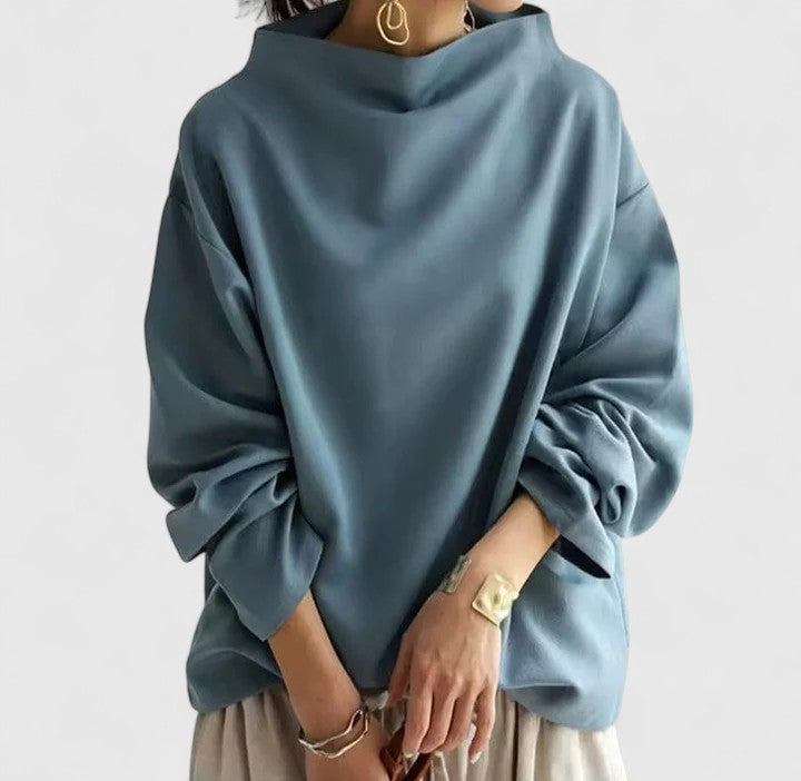 Sophisticated blue high-neck long-sleeve women's top. Comfortable & versatile, perfect for any occasion.