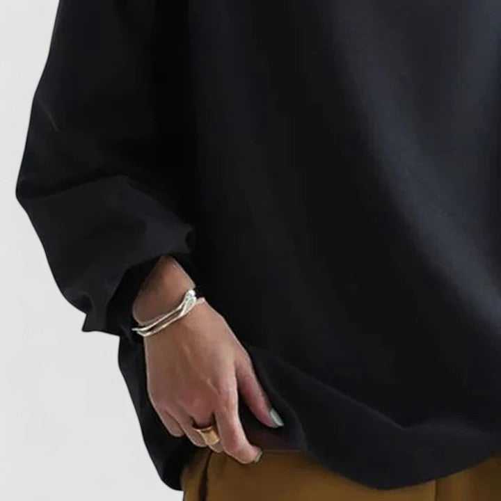 Comfortable & stylish black high-neck long-sleeve women's top. Elegant design, perfect for sophisticated looks.