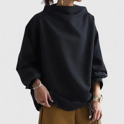 Elegant white high-neck long-sleeve women's top. Classic and comfortable, a sophisticated choice for daily wear.