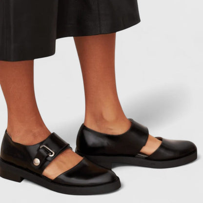 Elegant black low heel pumps for women, offering timeless style & all-day comfort. Perfect for formal or casual wear.
