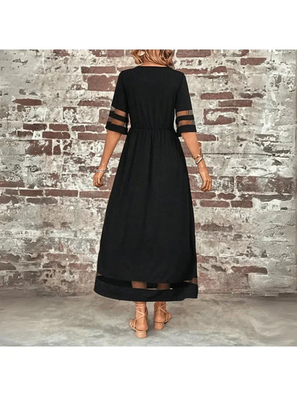 Flattering women's black midi dress, a versatile and elegant style with tummy coverage, ideal for casual or summer wear.
