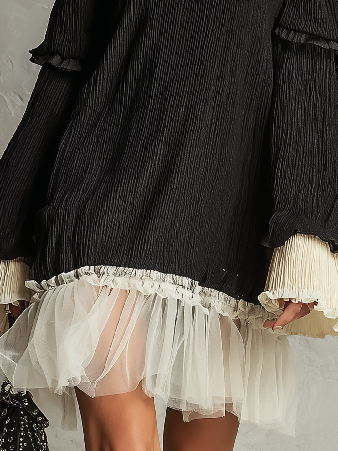 Fashionable black mini dress for women, with elegant off-shoulder ruffles & a flattering fit. Versatile party attire.