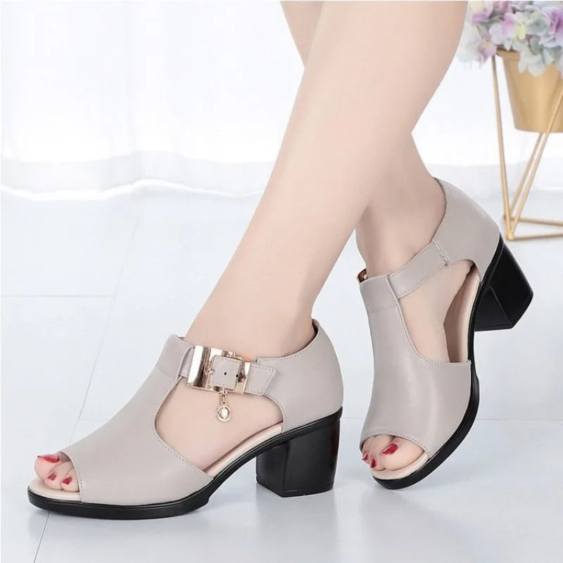 Chic and comfortable gray women's dress heels, featuring a stylish buckle and sturdy block heel.