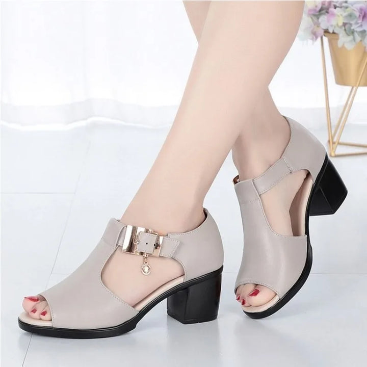 Chic and comfortable gray women's dress heels, featuring a stylish buckle and sturdy block heel.
