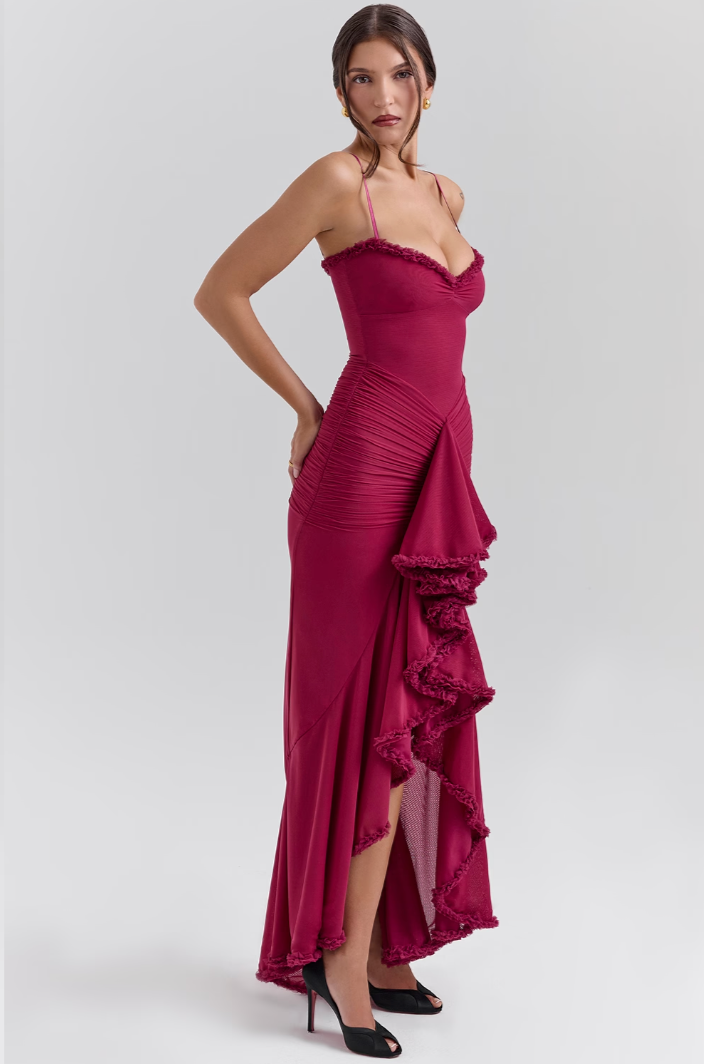 Flattering black ruched midi dress, elegant & chic design for women's cocktail events.