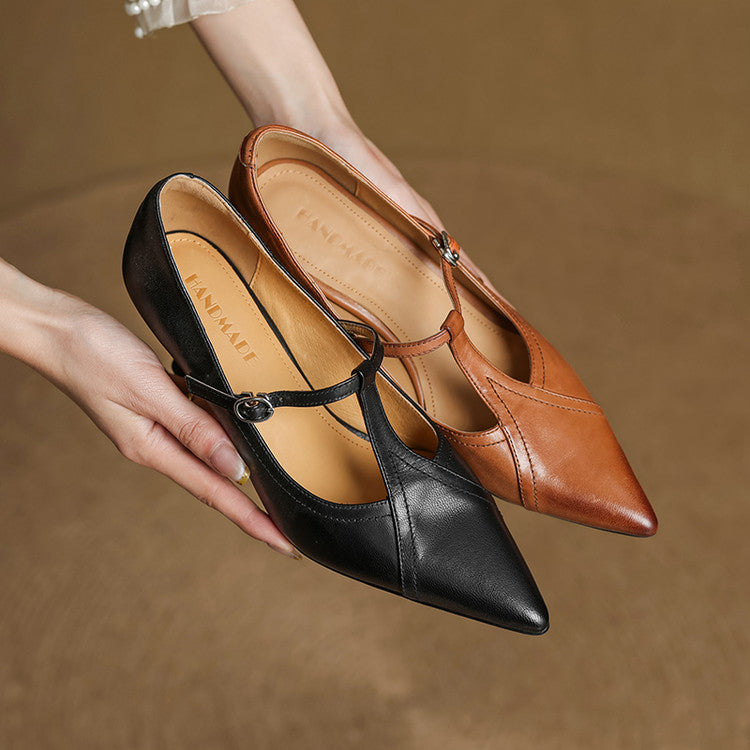 Women's elegant black T-strap formal heels, designed for confident style and comfort.